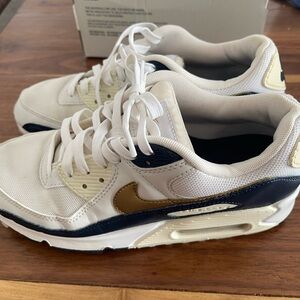 Nike White and Gold Athletic Shoes